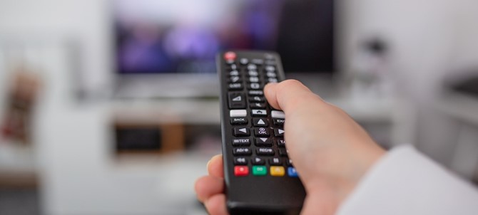 watching-tv-and-using-remote-controller-hand-with-remote-controller-changing-channels-or.jpg_s=1024x1024&w=is&k=20&c=ABal3U9Vn0yL7LZtJZKcNVski6aQ4RP0NxkBB-wJXOo=.jpg