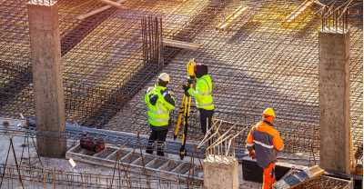 surveyors-at-the-construction-site-picture-id1385686986.jpg