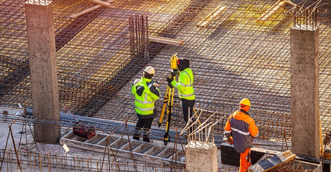 surveyors-at-the-construction-site-picture-id1385686986.jpg